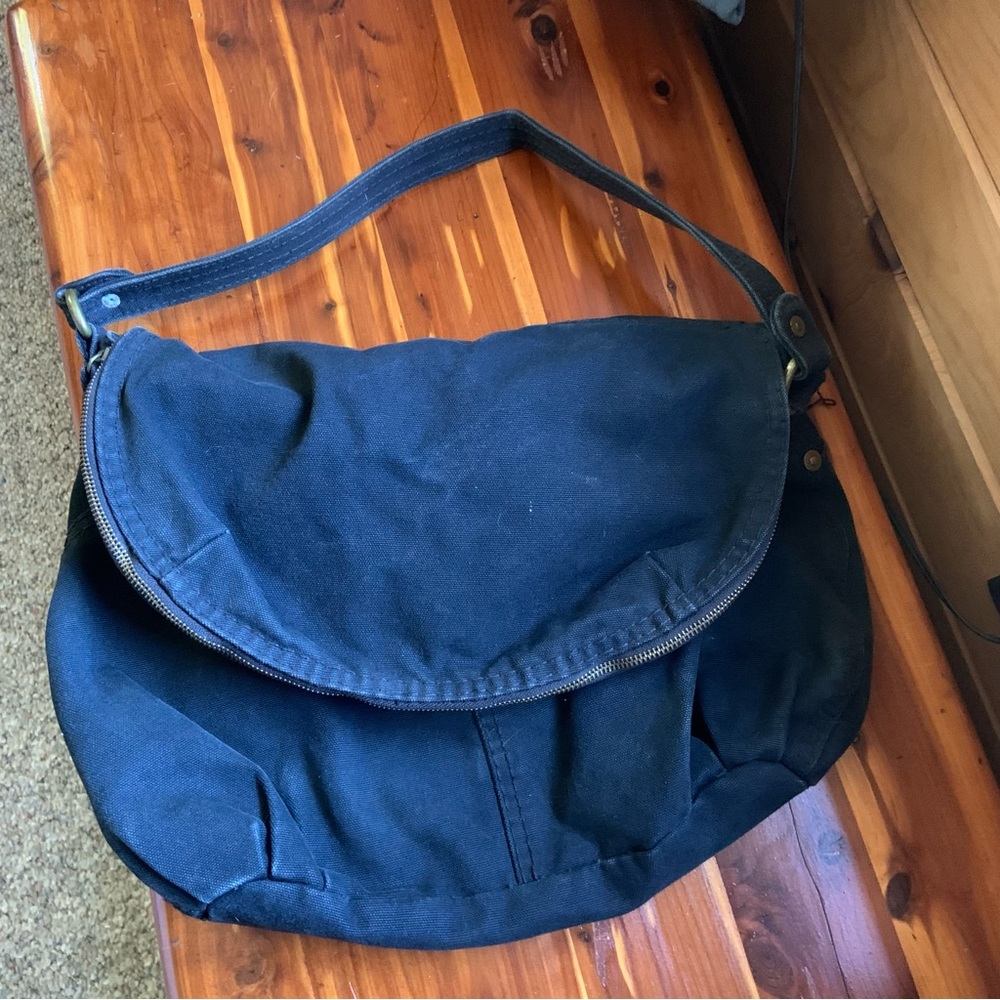 Large black canvas bag with colorful lining